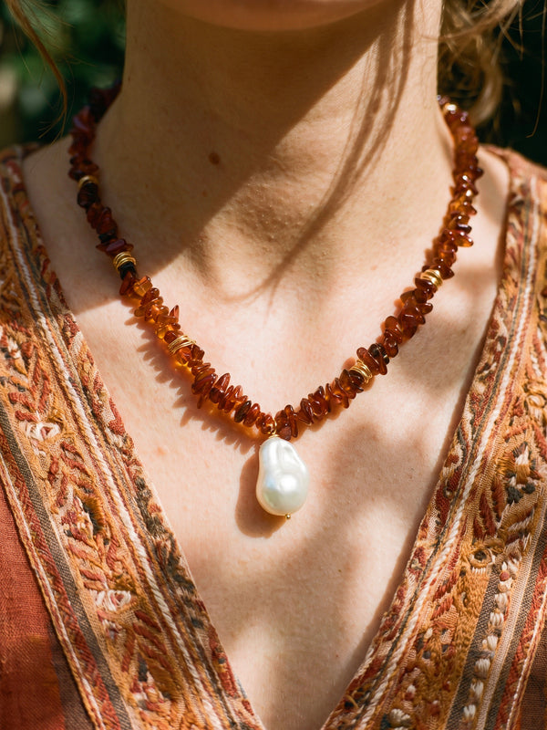 Volcanic flower necklace – natural stone with baroque pendant