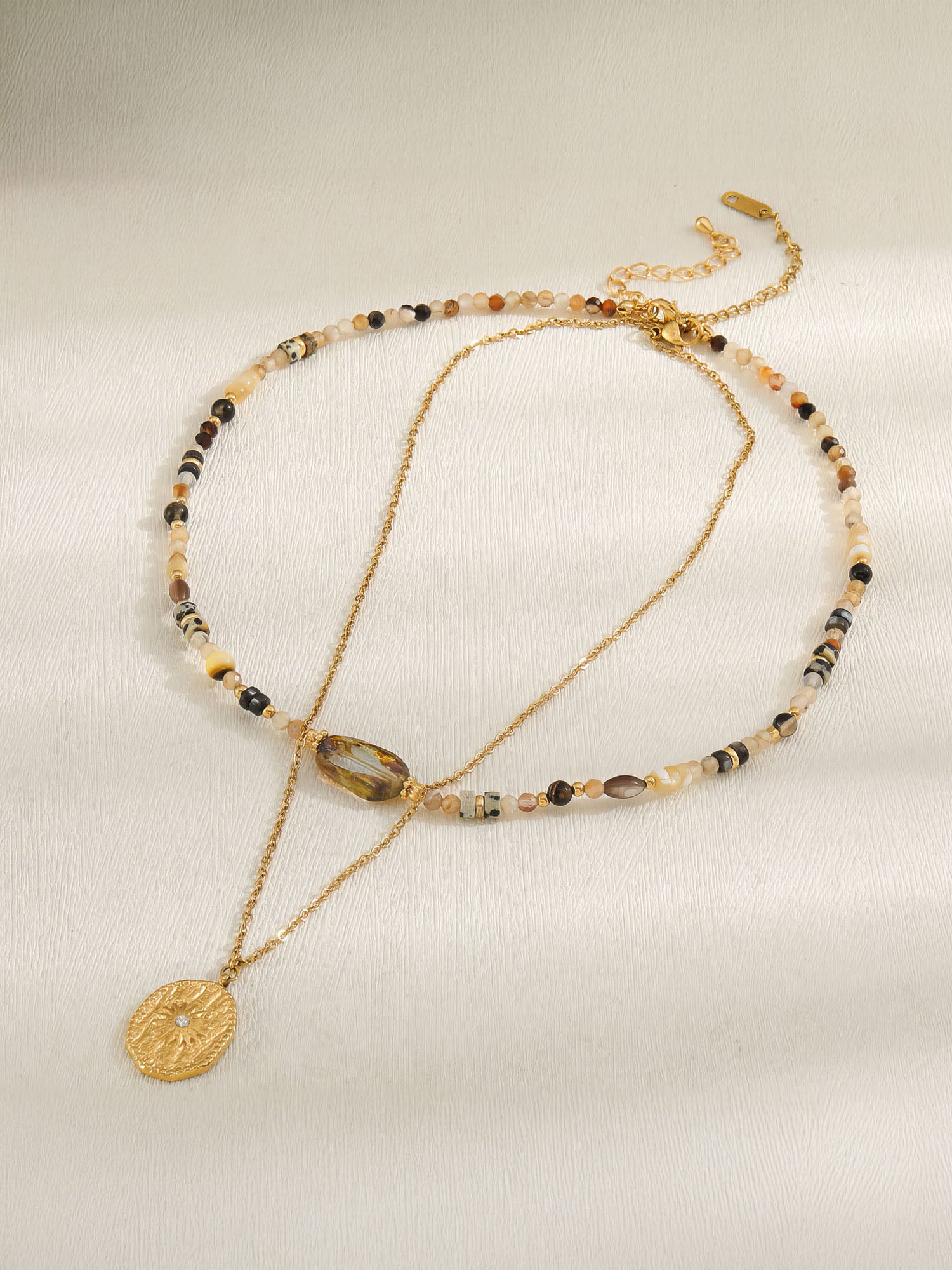 Kette Amberlicht – mit goldenem Talisman