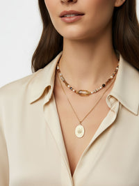 Kette Amberlicht – mit goldenem Talisman