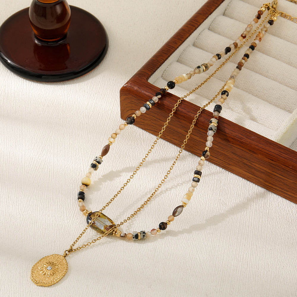 Kette Amberlicht – mit goldenem Talisman