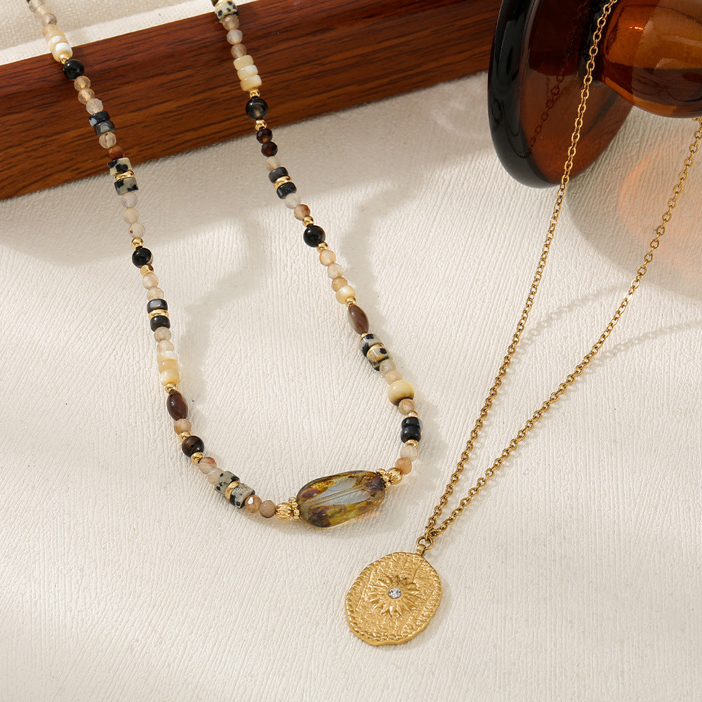 Kette Amberlicht – mit goldenem Talisman
