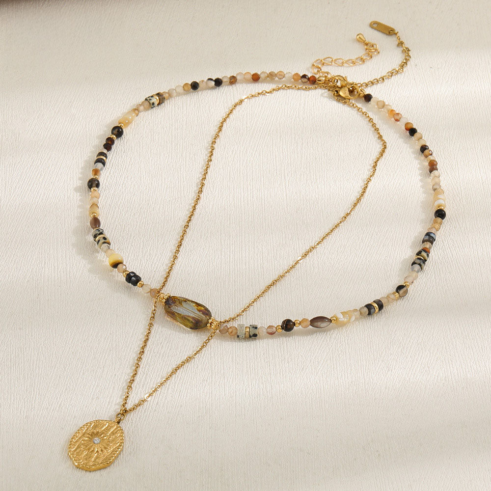 Kette Amberlicht – mit goldenem Talisman