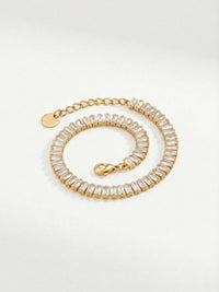 Tennis Armband Spiralform mit Karabinerverschluss und Verlaengerungskette 18K Gold