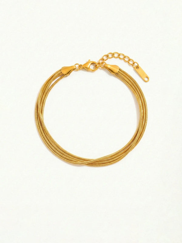 Quintuple Silk Armband – Fuenflagiges Armband aus goldenen Schlangenketten, 18K vergoldet, wie Seidenfaeden fliessend, weisser Hintergrund
