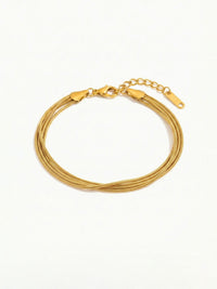 Quintuple Silk Armband Produktbild – Seitenansicht des fuenflagigen goldenen Armbands, weisser Hintergrund