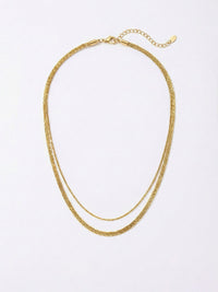 Triple Layer Gold Kette Produktfoto – dreifache Feingliederkette 18K vergoldet auf weissem Hintergrund