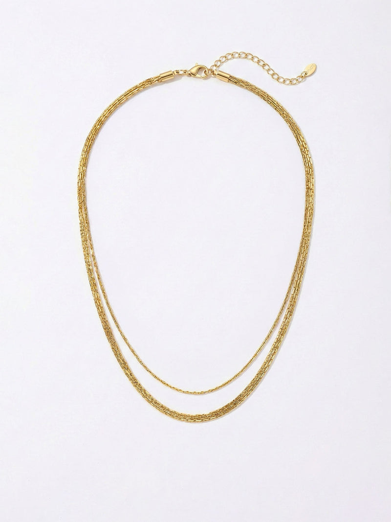 Triple Layer Gold Kette Produktfoto – dreifache Feingliederkette 18K vergoldet auf weissem Hintergrund