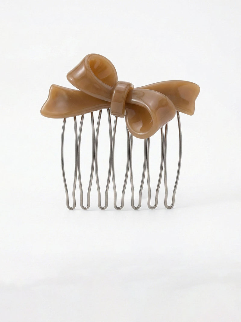Vintage Bow Cream Haarkamm Produktfoto – romantischer Schleifenkamm in warmem Cremeton auf weissem Hintergrund
