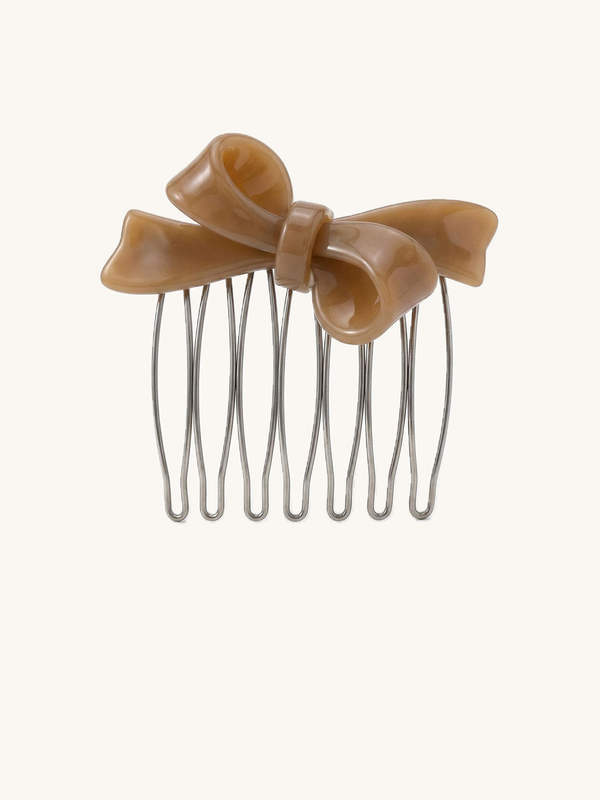 Vintage Bow Cream Haarkamm Produktfoto – romantischer Schleifenkamm in warmem Cremeton auf weissem Hintergrund