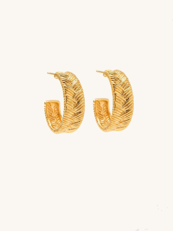 Featherweight Gold Hoop Earrings Product Photo – braided gold earrings with textured pattern on white background