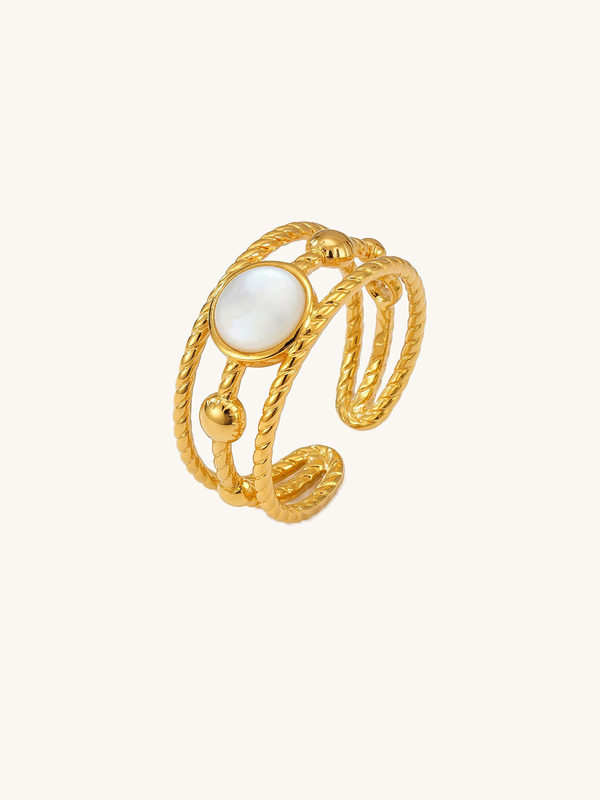 Ocean Twist multi-layer ring 18K gold-plated with mother-of-pearl stone twisted design on white background Nemomatheo