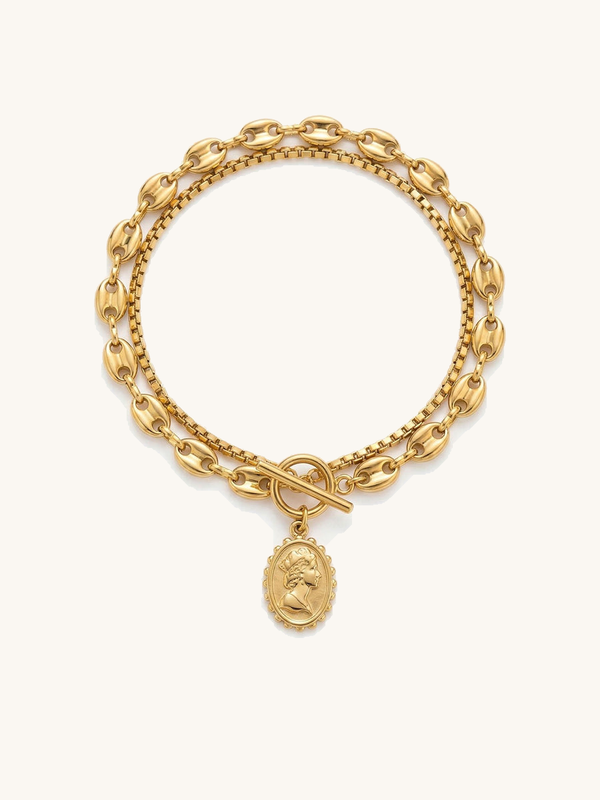 Victoria Gold Bracelet – Double-row bracelet with marinière anchor chain, cameo medallion, and toggle clasp, white background